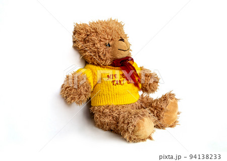 Lovely brown bear doll isolated on white background. Adorable teddy bear for decorative. High quality photo Lovely brown bear doll isolated on white background. Adorable teddy bear for decorative. High quality photo 94138233
