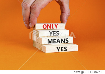 Only yes means yes symbol. Concept words Only yes means yes on wooden blocks on a beautiful orange table orange background. Businessman hand. Business, psychological only yes means yes concept. Only yes means yes symbol. Concept words Only yes means yes on wooden blocks on a beautiful orange table orange background. Businessman hand. Business, psychological only yes means yes concept. 94138749