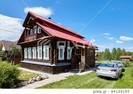 Rural wooden house in the village at summer sunny day Rural wooden house in the village at summer sunny day 94139105