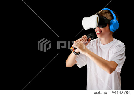 teenager use modern technologies for entertainment or education. VR musician concept 94142706