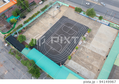 Aerial top view of soccer football sport recreation field ground, national stadium. Urban city town in Asia. Green court arena. Aerial top view of soccer football sport recreation field ground, national stadium. Urban city town in Asia. Green court arena. 94149967