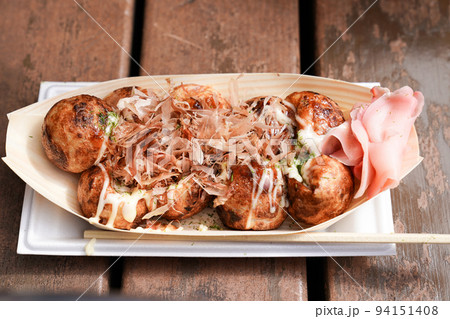 Takoyaki, Local Japanese octopus meat ball on the wood table, ready to eat. 94151408