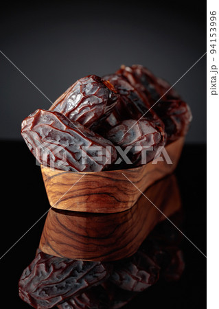 Dates on a black background. 94153996