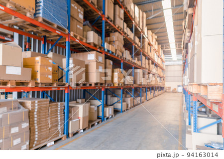 Rows of shelves with goods in the carton boxes in industry warehouse storage of factory 94163014