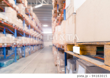 Rows of shelves with goods in the carton boxes in industry warehouse storage of factory 94163015