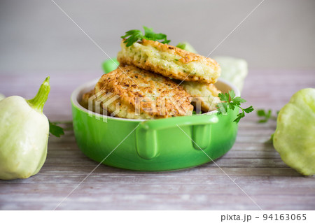 vegetable fried squash and zucchini cutlets in a ceramic form vegetable fried squash and zucchini cutlets in a ceramic form 94163065