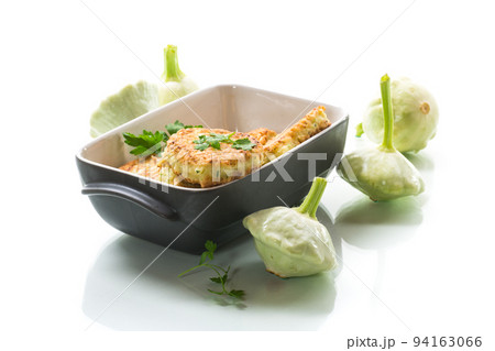 vegetable fried squash and zucchini cutlets in a ceramic form 94163066