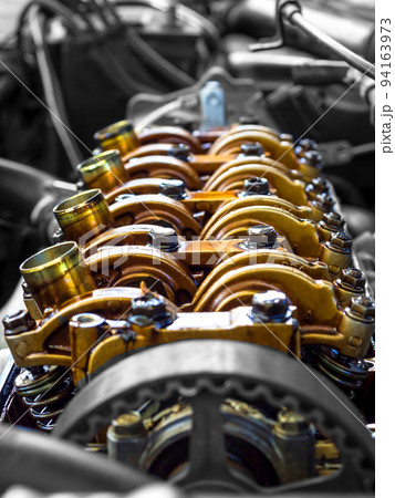 Close up of parts in engine head for adjust valve engine 94163973