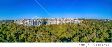 Austin, Texas- Large residential buildings on top of a mountain Austin, Texas- Large residential buildings on top of a mountain 94164251