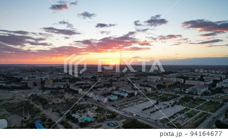 Orange sunset with view of city and the TV tower 94164677