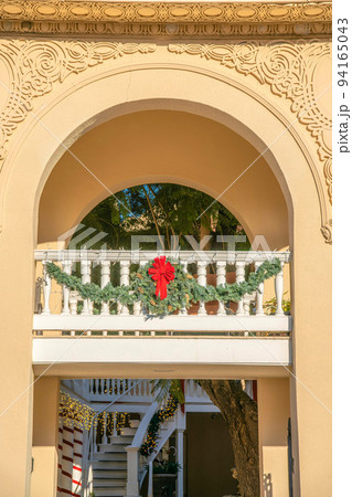 Downtown Tucson, Arizona- Building exterior with christmas decors on white railings Downtown Tucson, Arizona- Building exterior with christmas decors on white railings 94165043