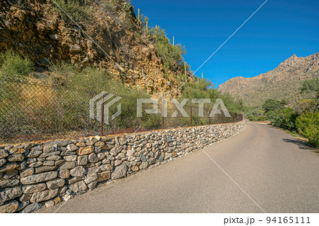 Sabino Canyon State Park, Tucson, Arizona- Retaining wall for landslide protection beside the road Sabino Canyon State Park, Tucson, Arizona- Retaining wall for landslide protection beside the road 94165111
