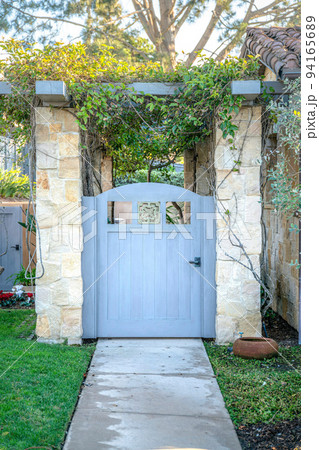 La Jolla, California- Painted gray single gate with arbor 94165689