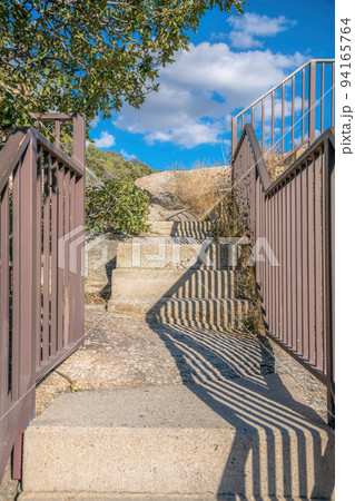 Mount Lemmon, Tucson, Arizona- Concrete stairs on a rock at a rest stop 94165764