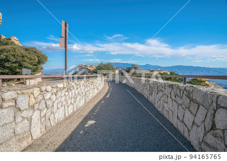 Mount Lemmon, Tucson, Arizona- Pathway on a rest stop with rock walls to a viewpoint 94165765