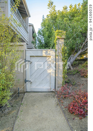 White wooden gate entry way to houses in Del Mar Southern California White wooden gate entry way to houses in Del Mar Southern California 94166039