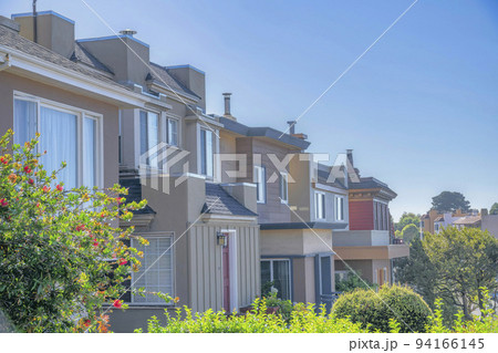 Exterior view of homes on a sunny day in San FranciscoCalifornia neighborhood 94166145