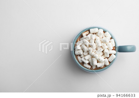 Delicious cocoa drink with marshmallows on white background, top view 94166633