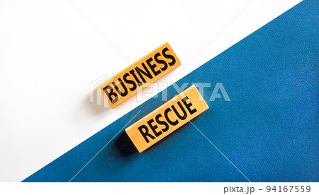Business rescue symbol. Concept words Business rescue on wooden blocks on a beautiful white and blue background. Business rescue and support concept. Copy space. Business rescue symbol. Concept words Business rescue on wooden blocks on a beautiful white and blue background. Business rescue and support concept. Copy space. 94167559