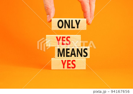 Only yes means yes symbol. Concept words Only yes means yes on wooden blocks on a beautiful orange table orange background. Businessman hand. Business, psychological only yes means yes concept. Only yes means yes symbol. Concept words Only yes means yes on wooden blocks on a beautiful orange table orange background. Businessman hand. Business, psychological only yes means yes concept. 94167656