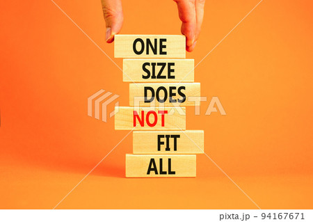 One size does not fit all symbol. Concept words One size does not fit all on wooden blocks. Businessman hand. Beautiful orange background. One size does not fit all business concept. Copy space. One size does not fit all symbol. Concept words One size does not fit all on wooden blocks. Businessman hand. Beautiful orange background. One size does not fit all business concept. Copy space. 94167671
