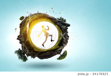 Portrait of energetic businessman jumping in open air 94176925