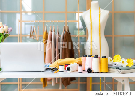 Close up items and equipment material for work designer in the showroom. Mannequins stylish tailor measurements 94181011