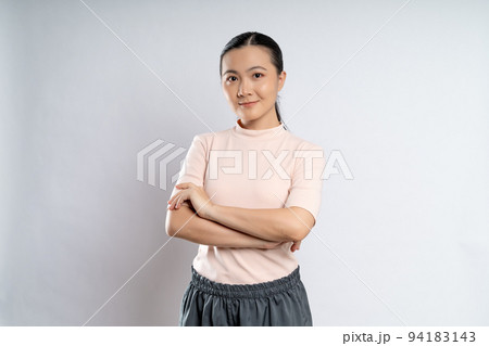 Asian woman happy confident standing crossed arms, looking at camera. 94183143