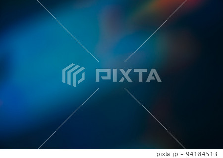 Blur light leak. Lens flare. Bokeh rays. Optical radiance. Defocused blue red color beam glow on dark night abstract copy space background. 94184513