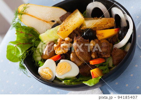 Salad of chicken hearts with peach, pear, fried cheese, quail eggs 94185407