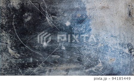 Grunge texture. Weathered wall. Distressed surface. Blue beige dirt stains dust scratches noise on dark abstract illustration background. 94185449
