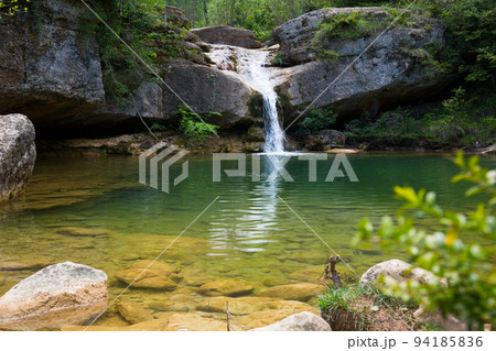 Waterfall in Catalonia surrounded by beautiful forests 94185836