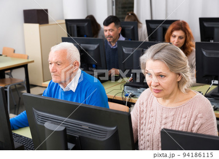 Elderly people attending pc class Elderly people attending pc class 94186115