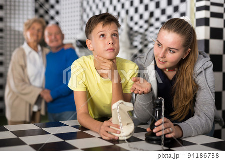 Grandkids and grandparents in escape room Grandkids and grandparents in escape room 94186738