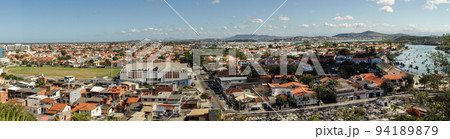 panoramic of Cabo Frio cityscape, Rio de Janeiro, Brazil. Buildings of coastal city panoramic of Cabo Frio cityscape, Rio de Janeiro, Brazil. Buildings of coastal city 94189879
