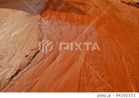 Red clay. Muddy stream Red clay. Muddy stream 94192553
