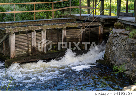 Water intake at an old water mill at Ronne river, Stockamollan, Scania, Sweden Water intake at an old water mill at Ronne river, Stockamollan, Scania, Sweden 94195557
