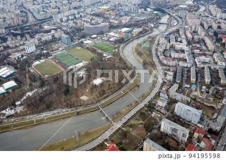 Aerial above view of river crossing the city Aerial above view of river crossing the city 94195598