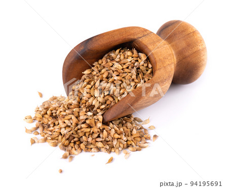 Utsho suneli seeds in wooden scoop, isolated on white background. Trigonella caerulea or blue fenugreek. Top view. Utsho suneli seeds in wooden scoop, isolated on white background. Trigonella caerulea or blue fenugreek. Top view. 94195691