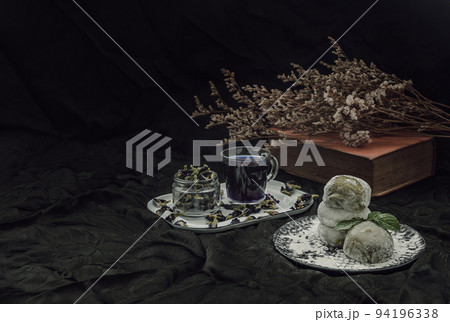 Green tea and Red bean daifuku with Butterfly pea tea. Japanese tradiitonal snack. 94196338