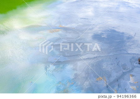 Aerial view of chemical residuals flooding a lake from a copper mine exploitation 94196366