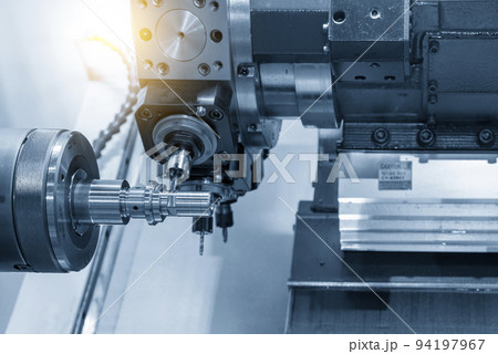 The multi-tasking CNC lathe machine swiss type milling cut the metal parts by milling spindle. 94197967