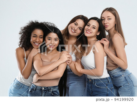 Group of women with different body types on light background Group of women with different body types on light background 94199920
