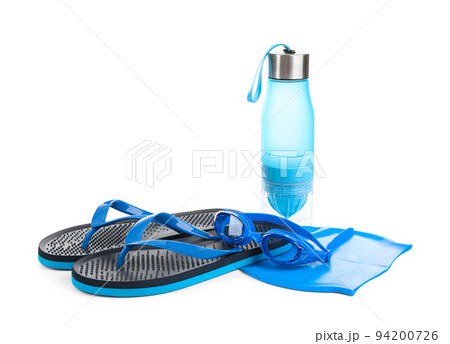 Swimming cap, goggles, water bottle and flip flops isolated on white Swimming cap, goggles, water bottle and flip flops isolated on white 94200726