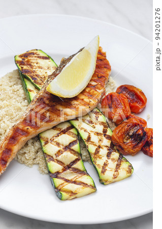 grilled poultry meat with tomatoes zucchini served with couscous grilled poultry meat with tomatoes zucchini served with couscous 94201276