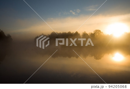 fog and sun on the river fog and sun on the river 94205068