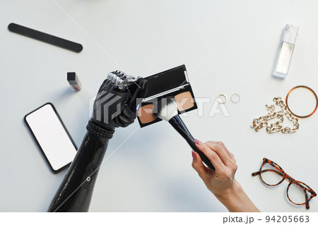 Woman with disability applying blush 94205663