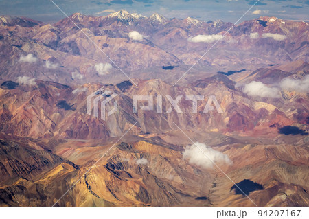 Andes cordillera and Atacama aerial view, dramatic volcanic landscape Andes cordillera and Atacama aerial view, dramatic volcanic landscape 94207167
