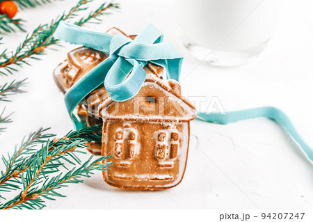 Milk and Christmas cookies for Santa. Christmas background. gingerbread cookies 94207247