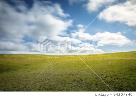 Blurred clouds motion and Rio Grande do Sul pampa - Southern Brazil Blurred clouds motion and Rio Grande do Sul pampa - Southern Brazil 94207340